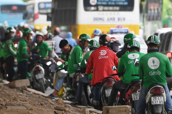 Mỗi cuốc xe, Grab, GoViet, Be đang “đốt” 1-2,5 USD?